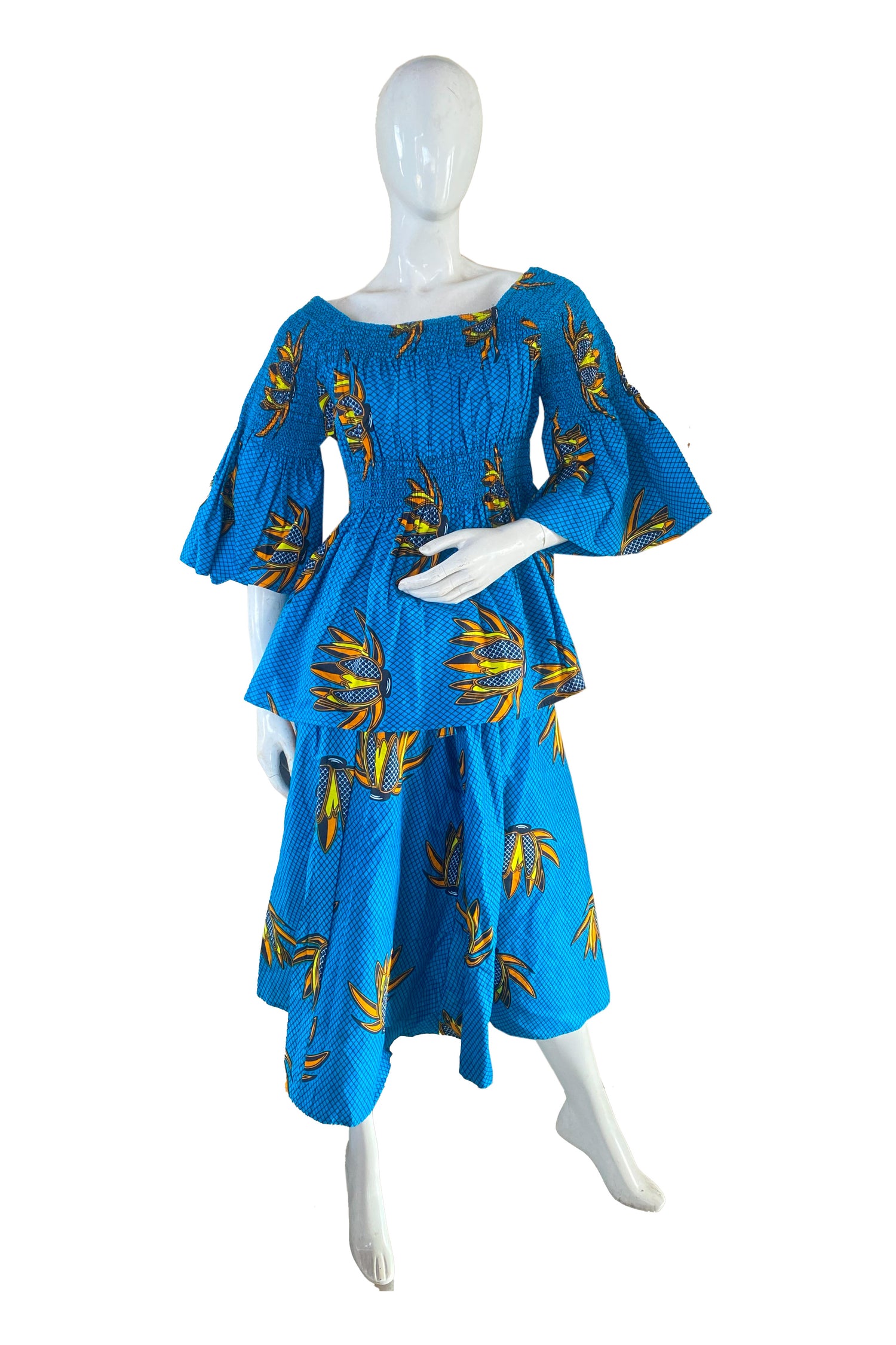 African ladies smocked peplum blouse and skirt set with matching headwrap