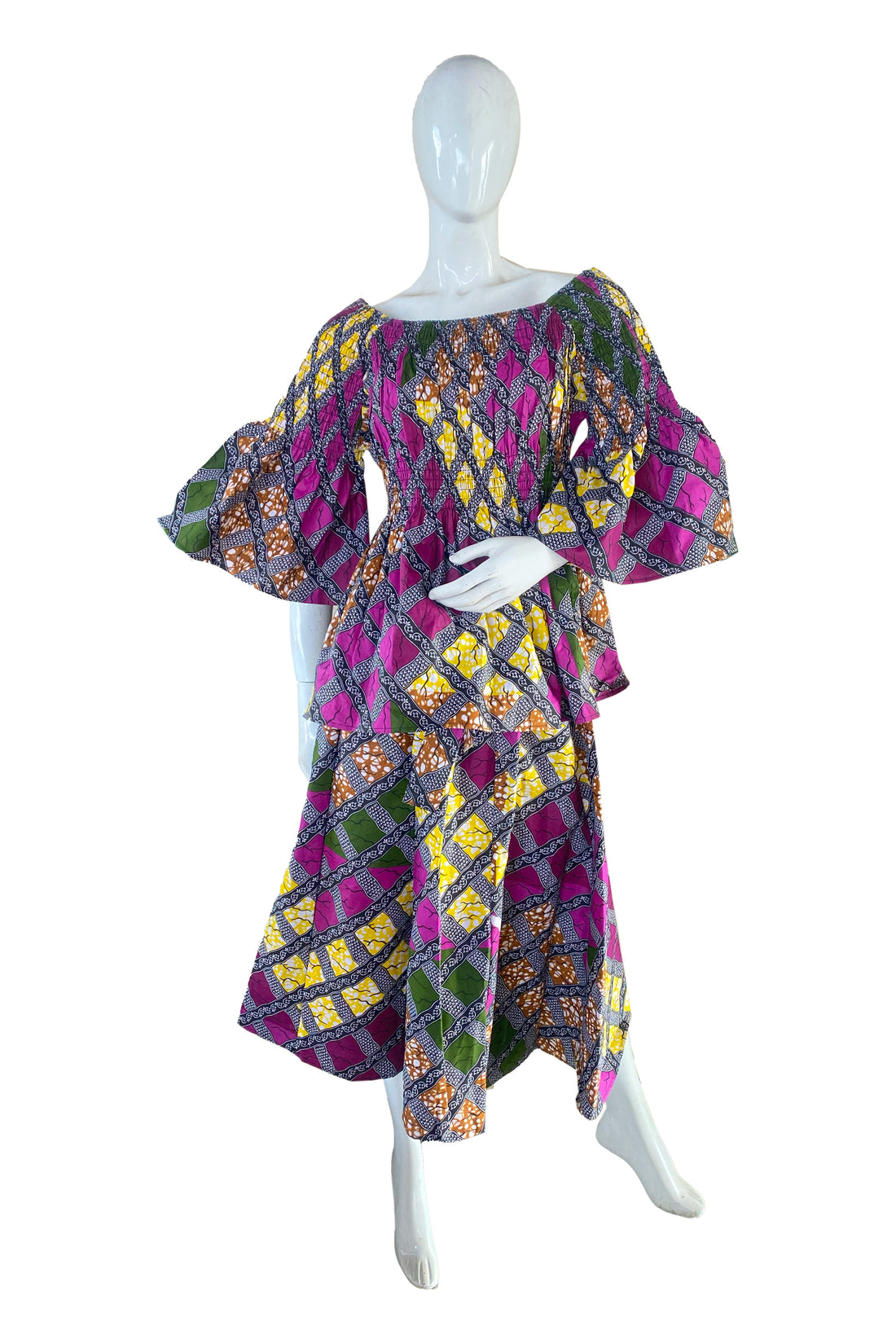 African ladies smocked peplum blouse and skirt set with matching 