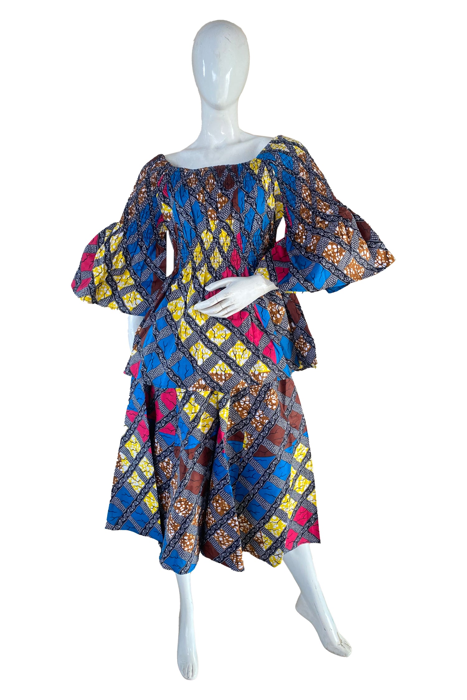 African ladies smocked peplum blouse and skirt set with matching headwrap