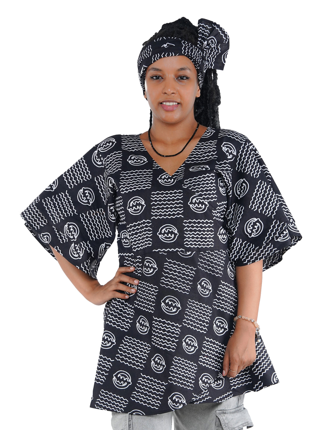 Woman wearing African print wrap top with 3/4 sleeves double layered – cotton, one size,  – Ankara inspired
