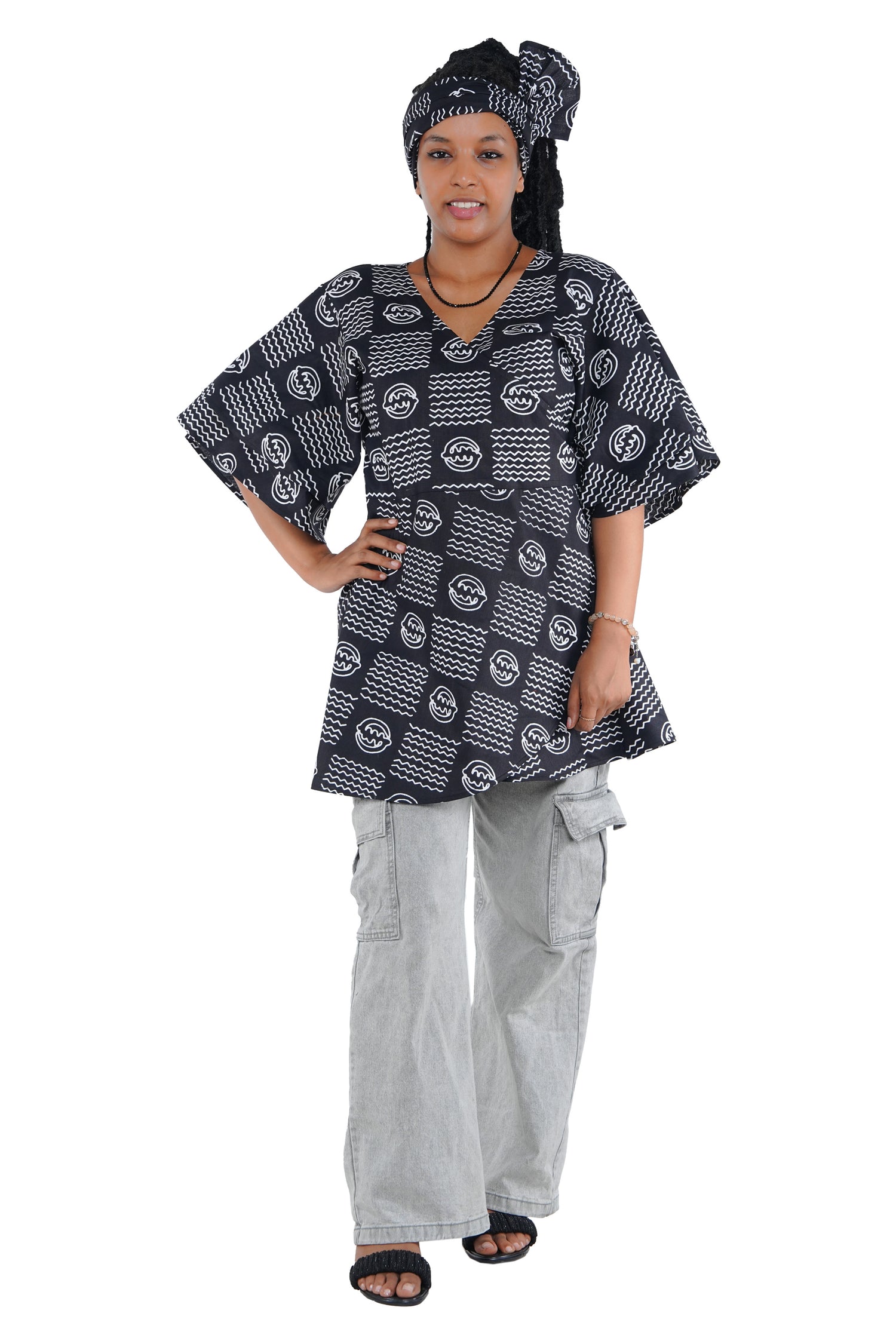 Woman wearing African print wrap top with 3/4 sleeves double layered – cotton, one size,  – Ankara inspired