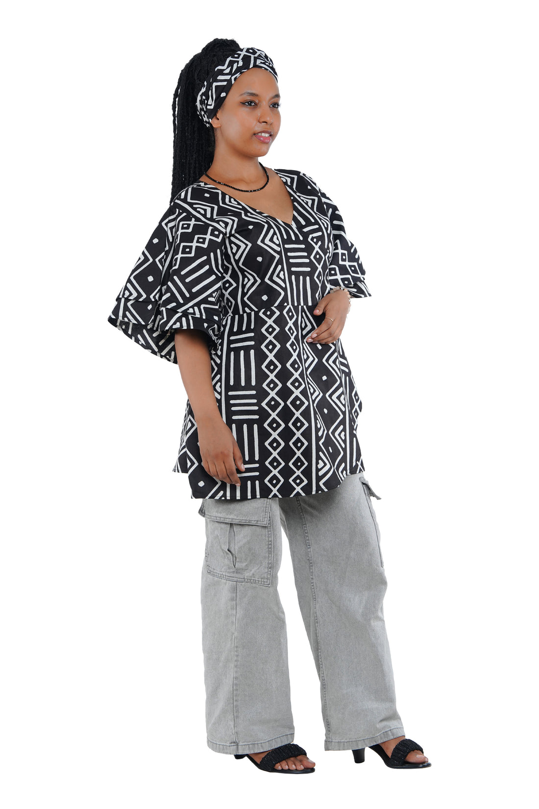 Woman wearing African print wrap top with 3/4 sleeves double layered – cotton, one size,  – Ankara inspired