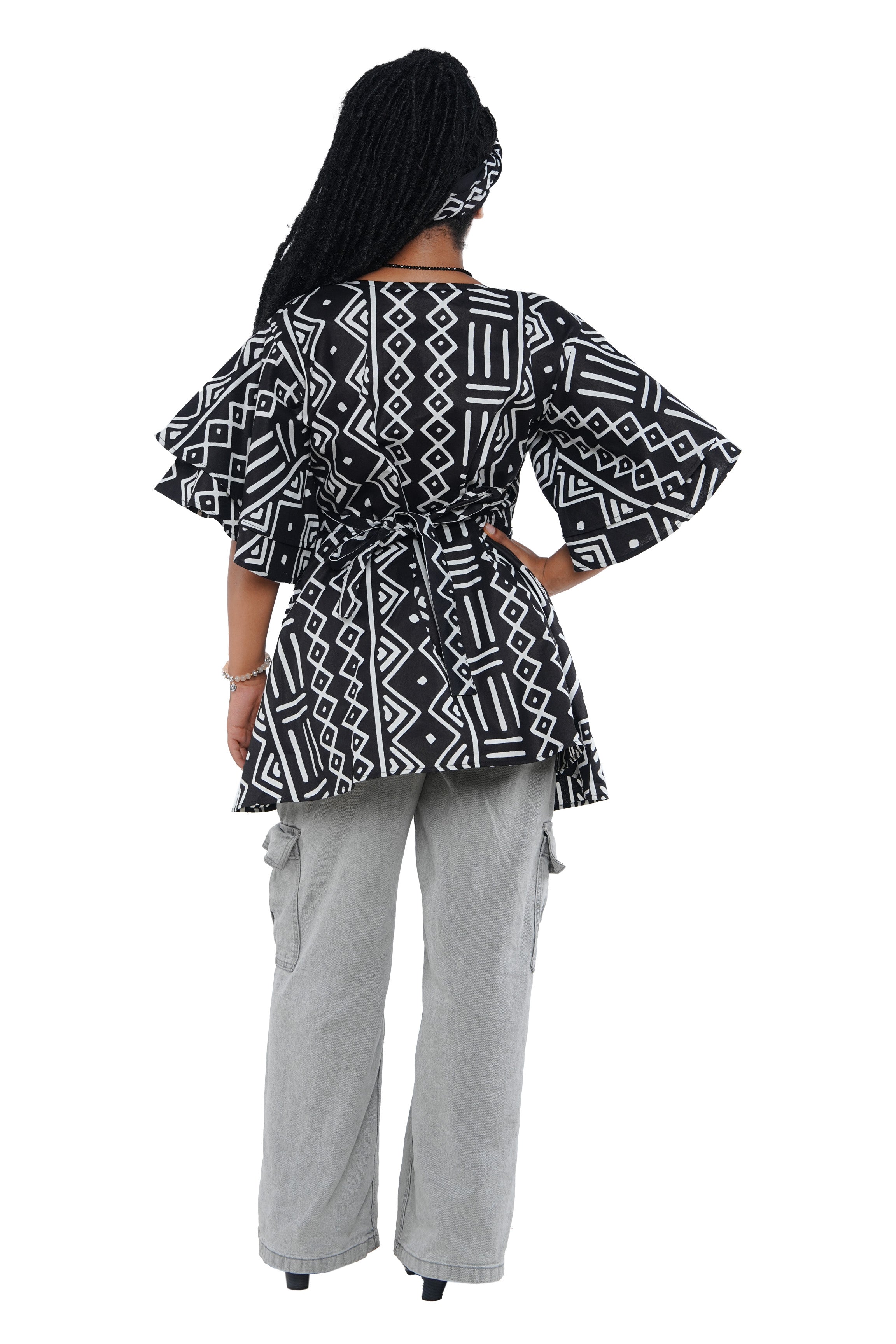 Woman wearing African print wrap top with 3/4 sleeves double layered – cotton, one size,  – Ankara inspired