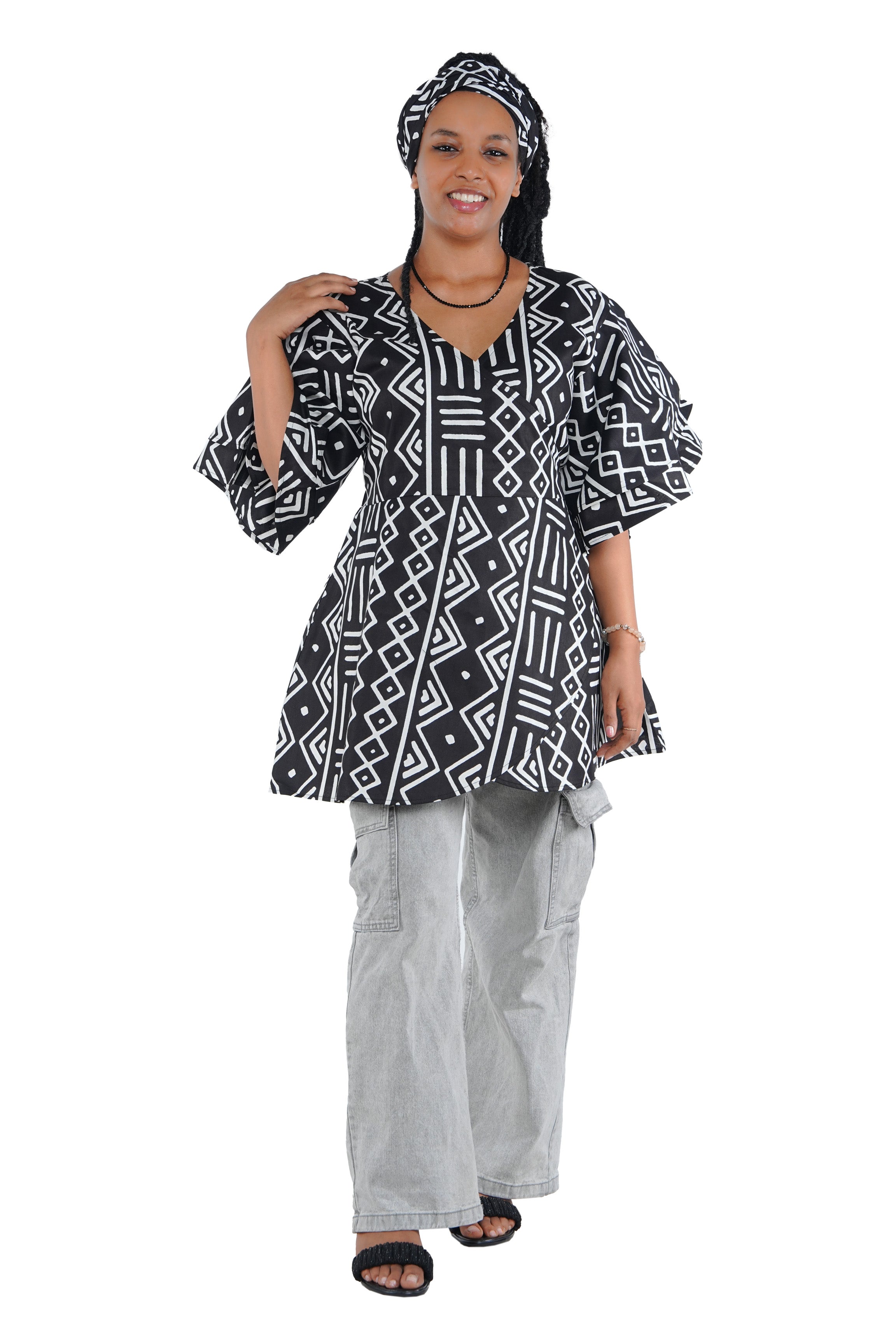 Woman wearing African print wrap top with 3/4 sleeves double layered – cotton, one size,  – Ankara inspired