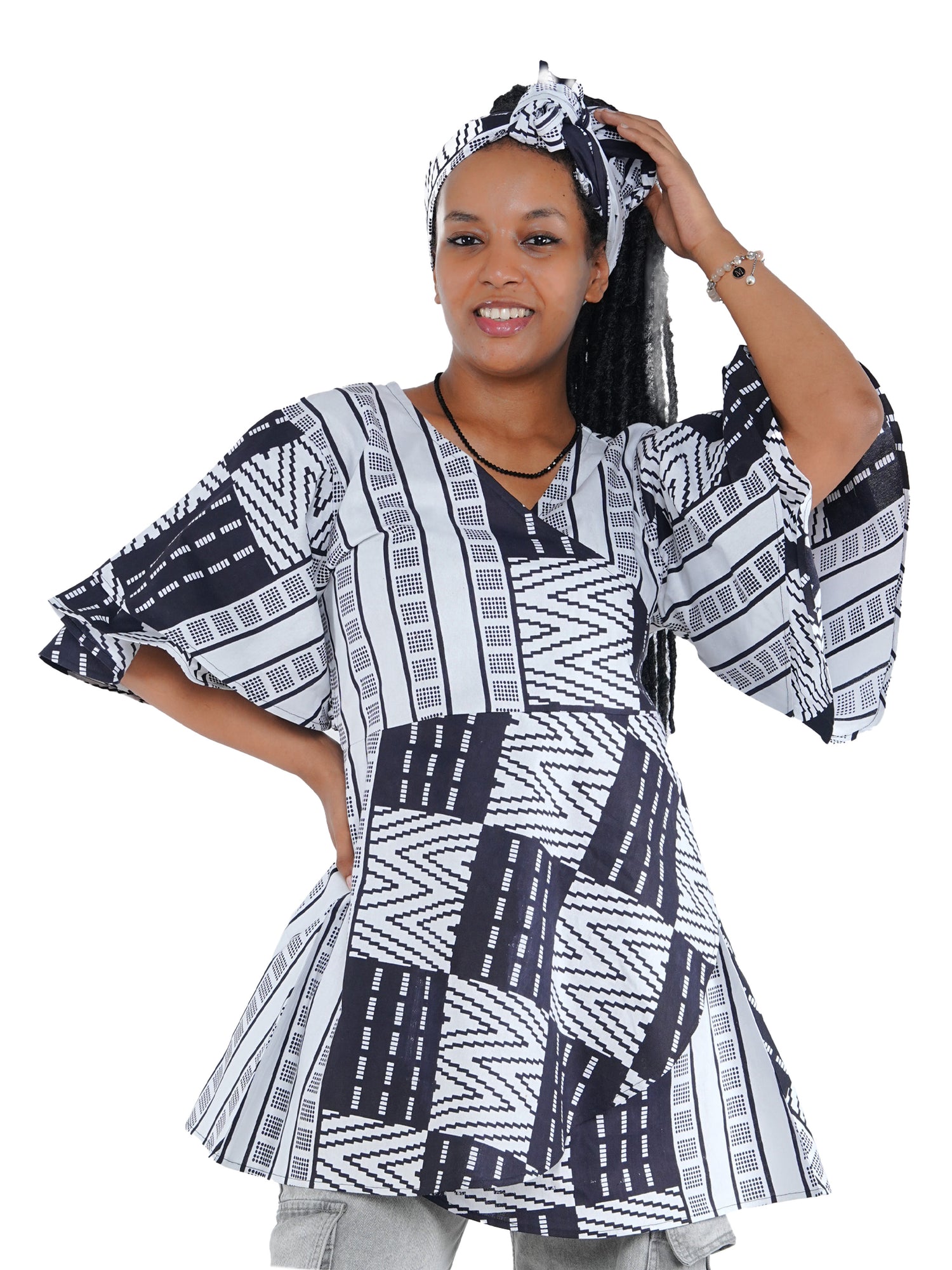 Woman wearing African print wrap top with 3/4 sleeves double layered – cotton, one size,  – Ankara inspired